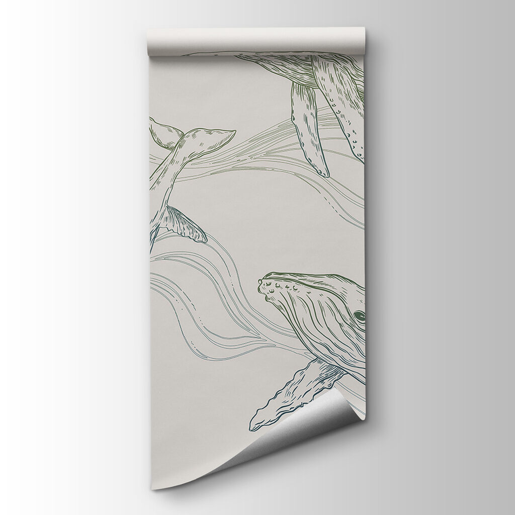 A group of whales swimming in the water