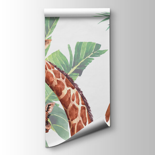 A group of giraffes with their heads in front of leaves A group of giraffes with their heads in front of leaves