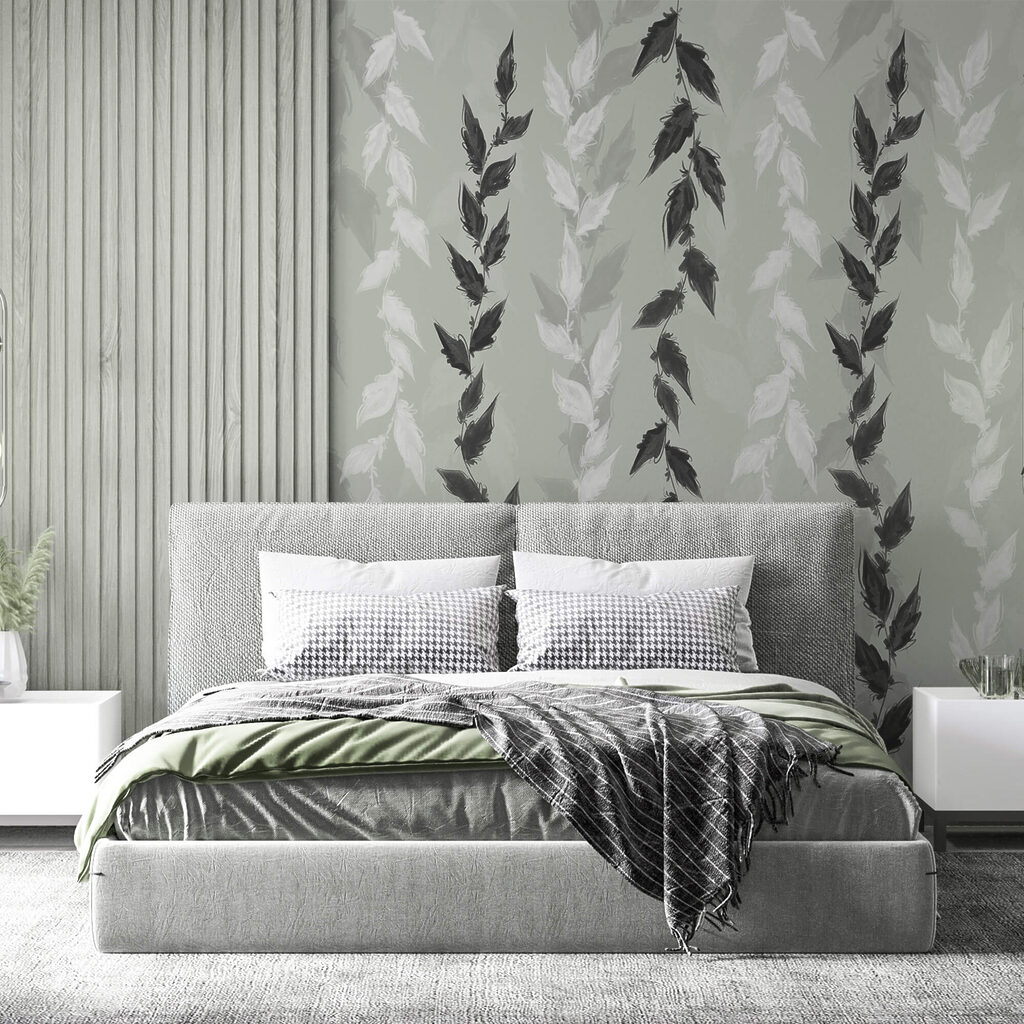 Hojas blancas y negras sobre fondo gris