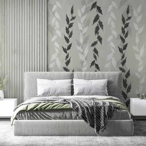 Hojas blancas y negras sobre fondo gris