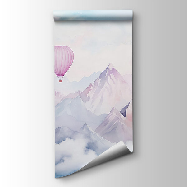 Group of hot air balloons in the sky over mountains