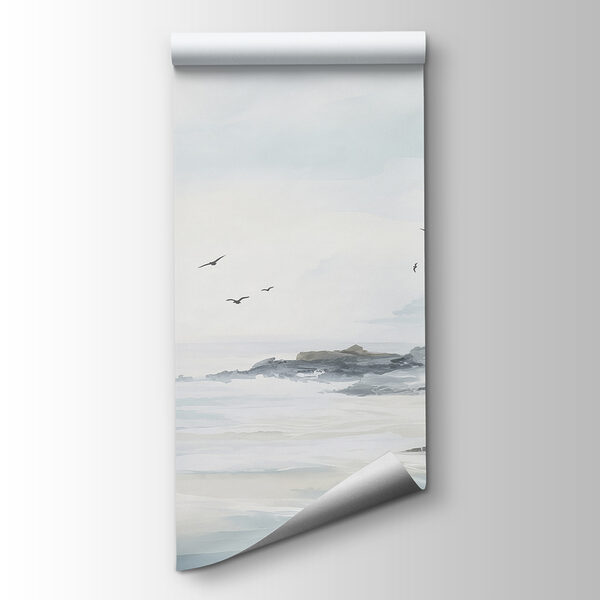 Birds flying over a rocky beach Birds flying over a rocky beach