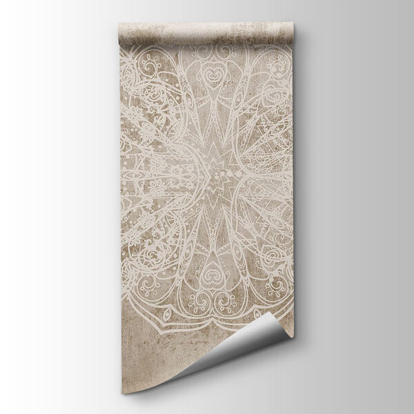 White ornate design on a brown surface