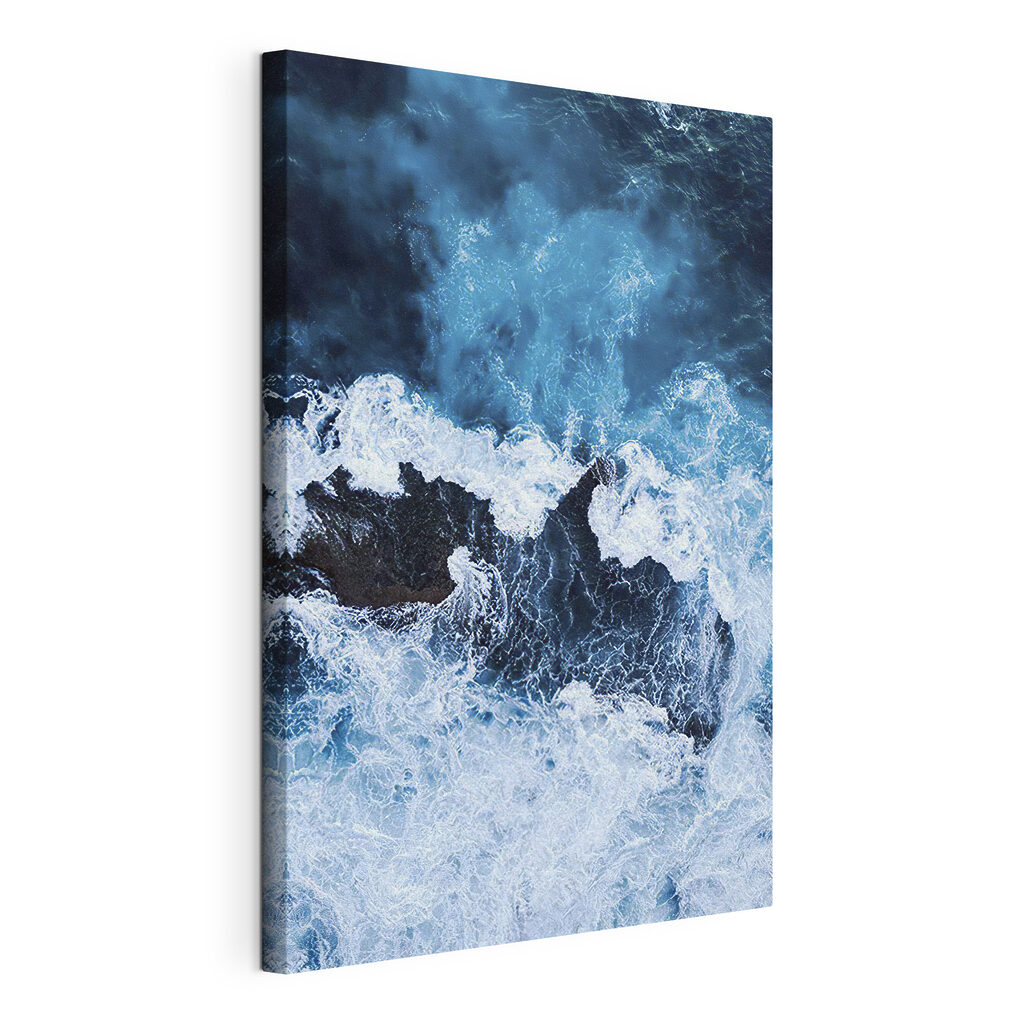 Waves crashing on a rock