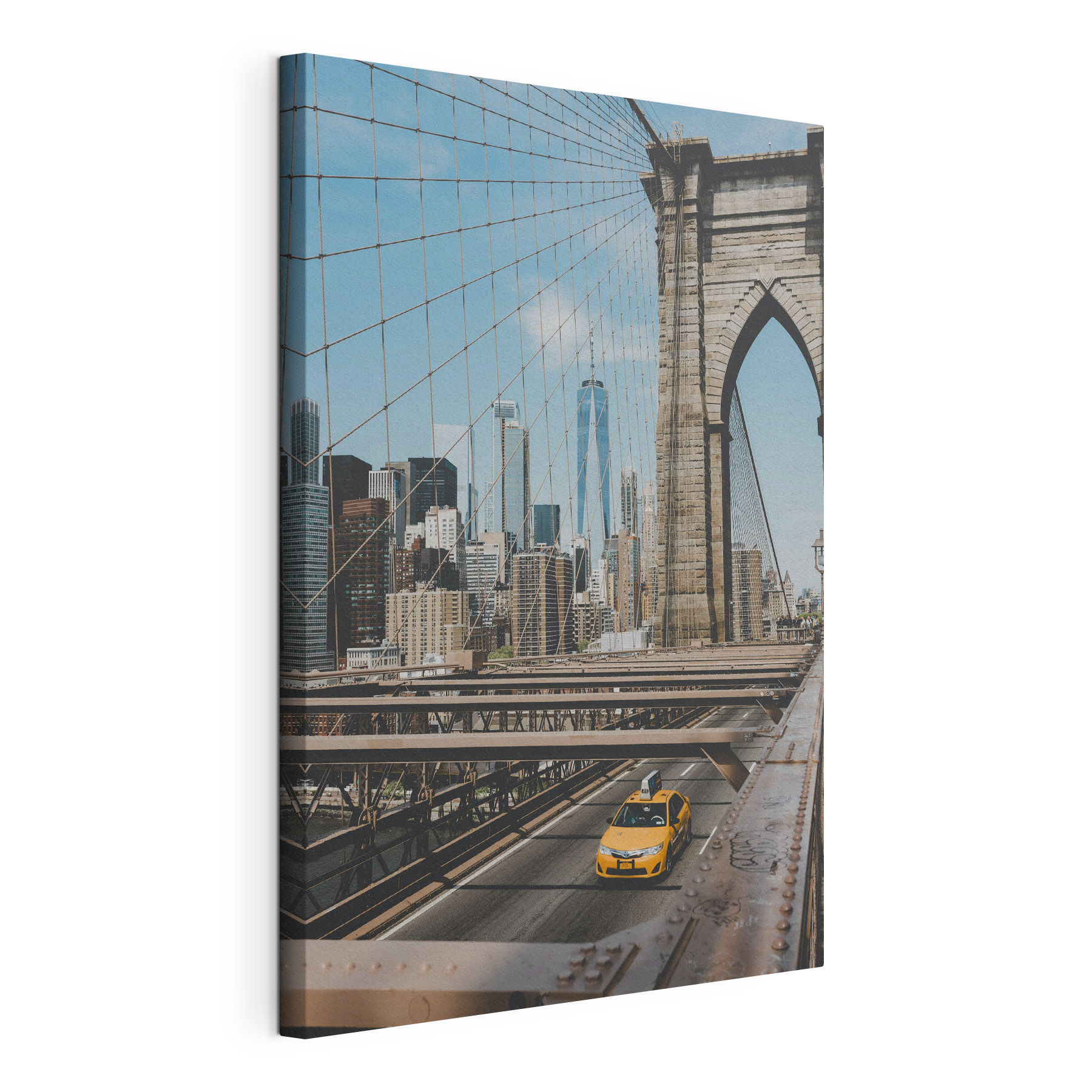 Brooklyn Bridge with a yellow taxi driving down it Brooklyn Bridge with a yellow taxi driving down it