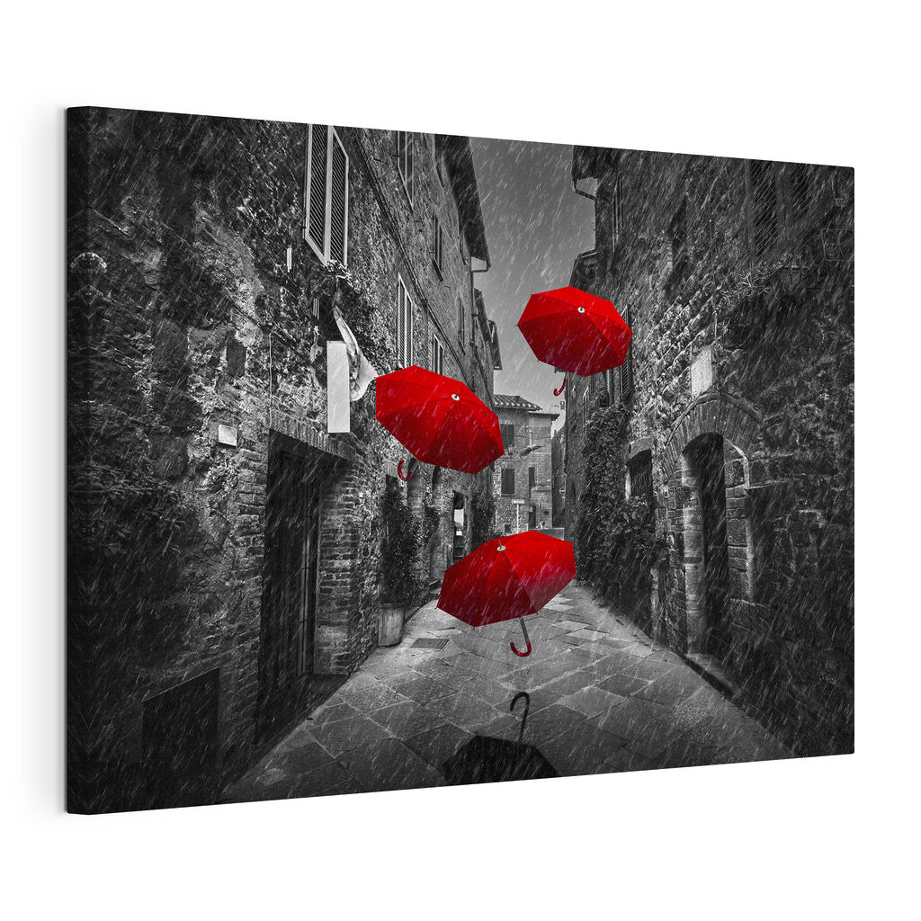 A group of red umbrellas flying in the air A group of red umbrellas flying in the air