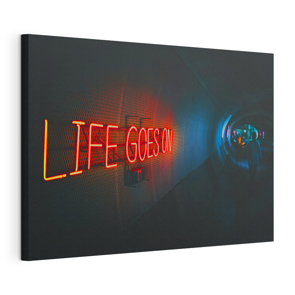 A neon sign in a tunnel