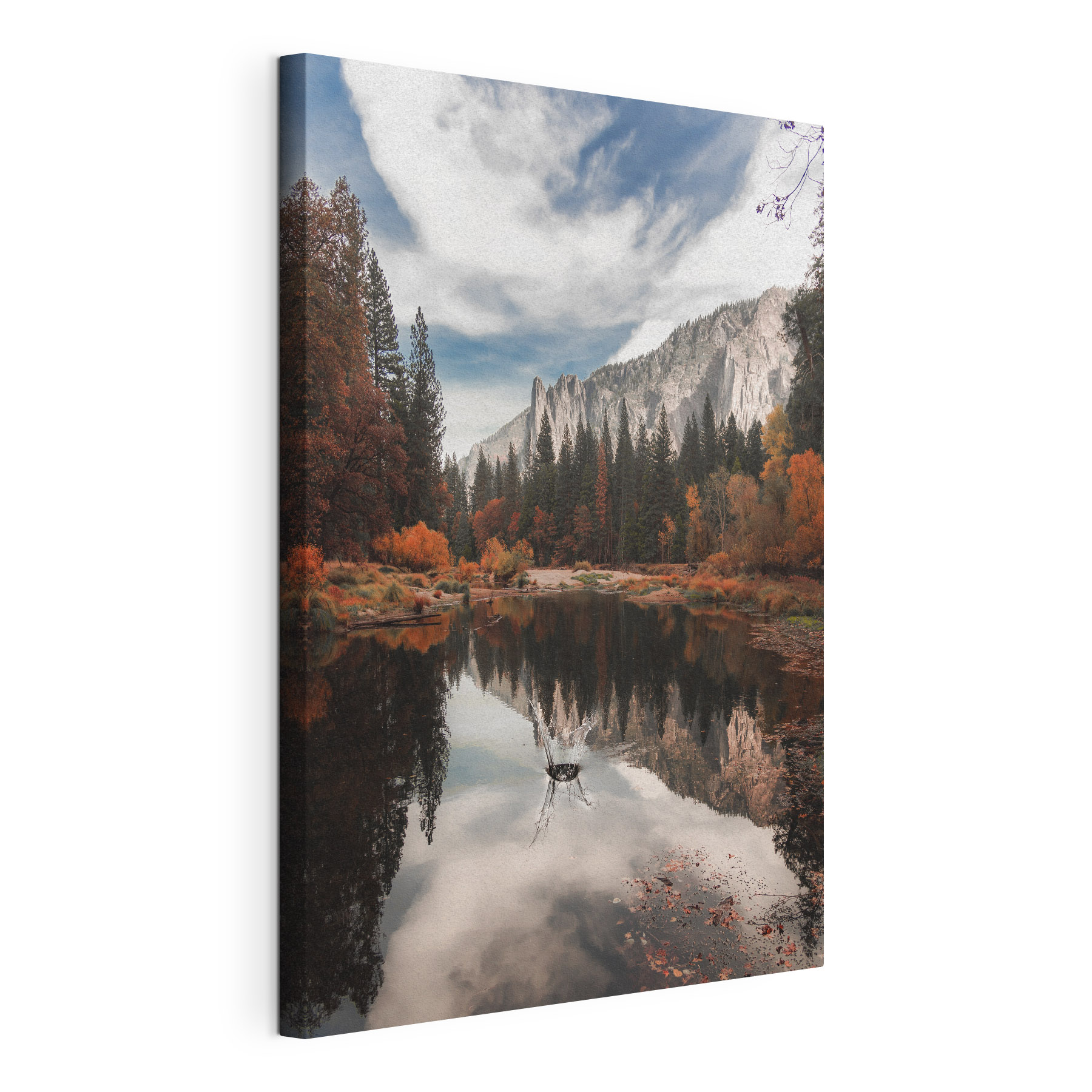 A lake surrounded by trees and mountains A lake surrounded by trees and mountains