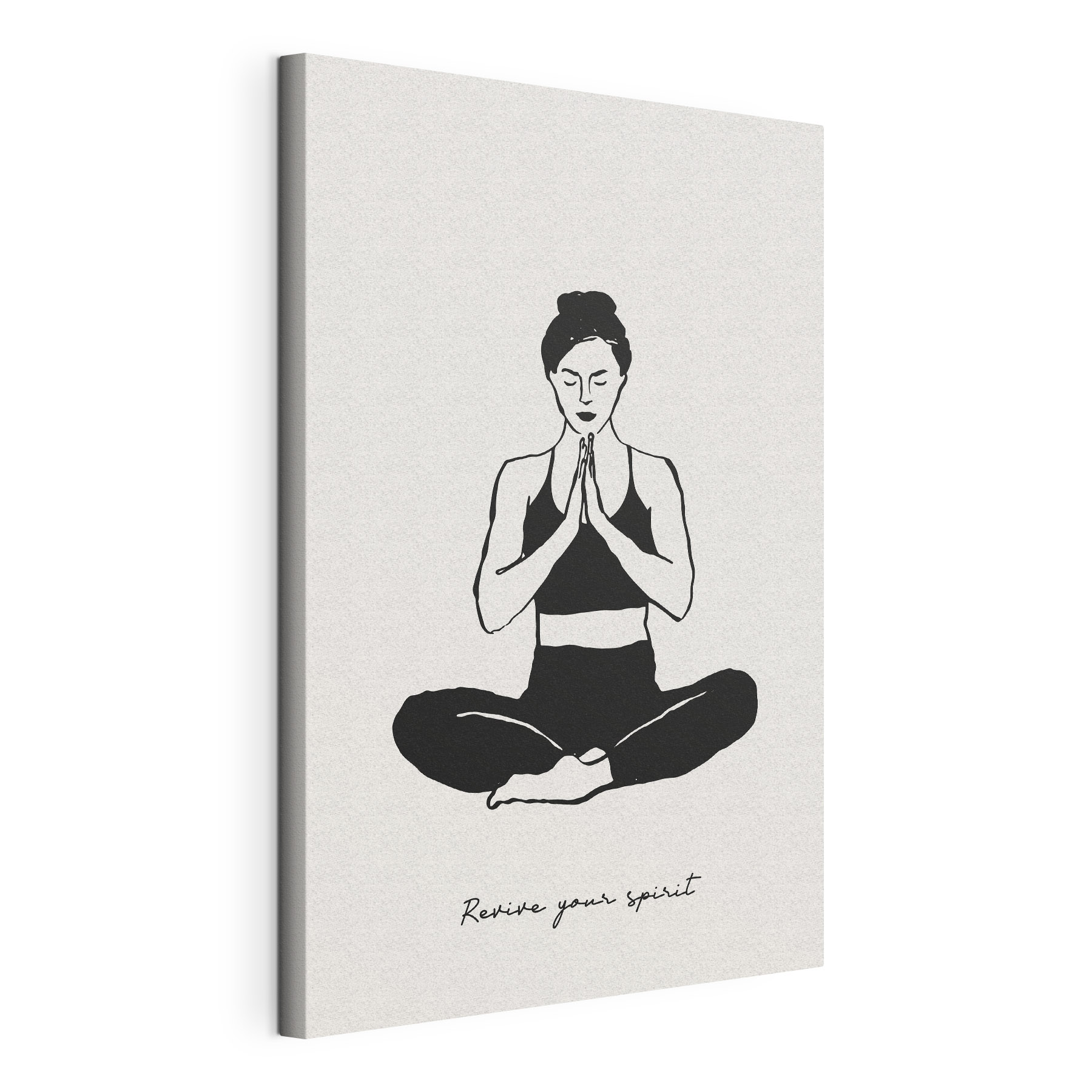A woman sitting cross legged with her hands together
