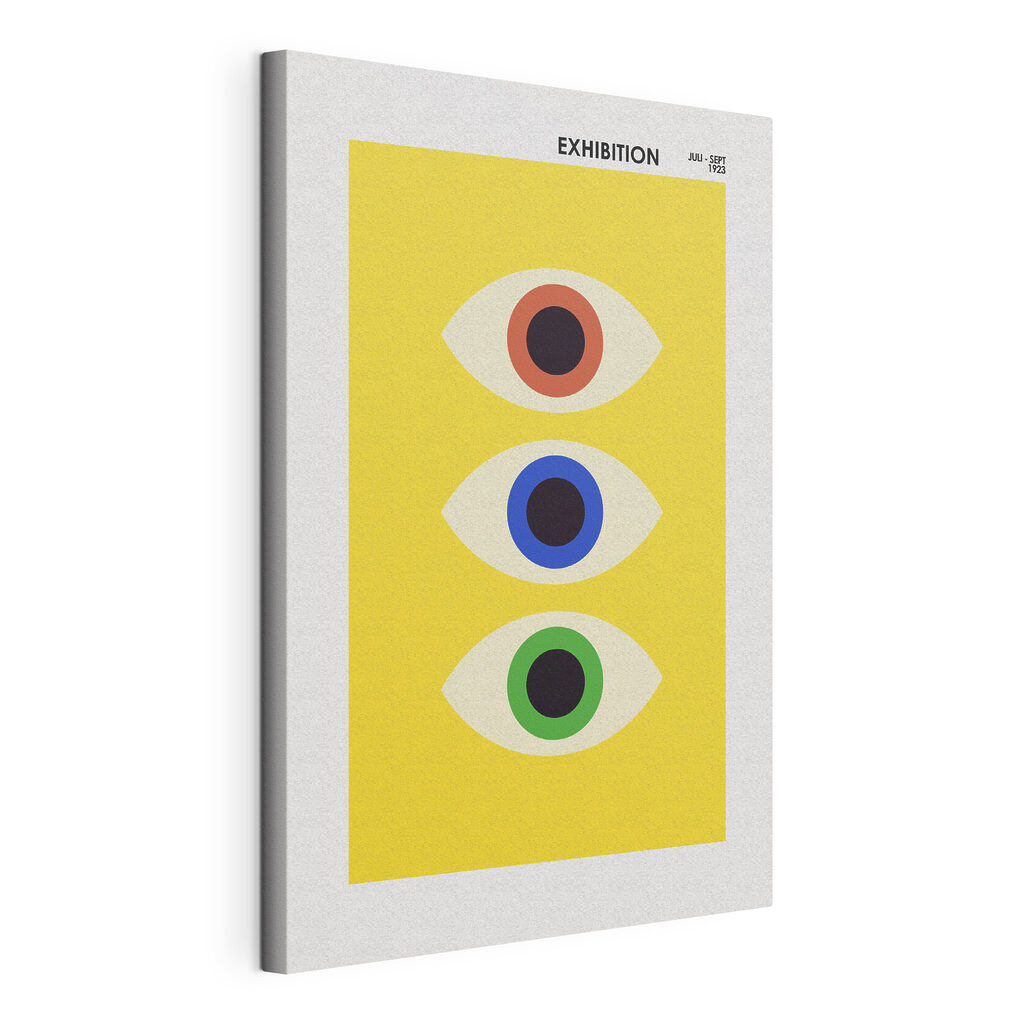 A yellow rectangular object with multi colored eyes A yellow rectangular object with multi colored eyes