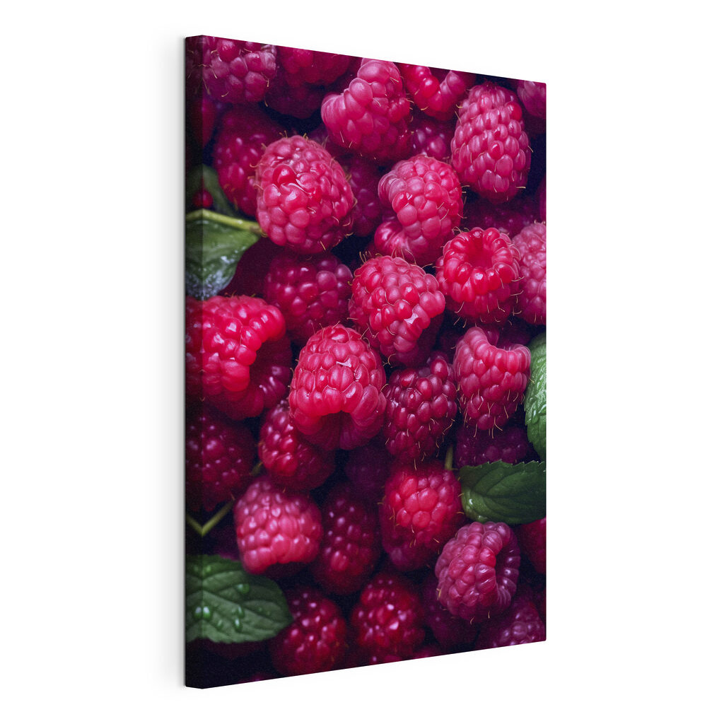 Pile of raspberries with leaves Pile of raspberries with leaves