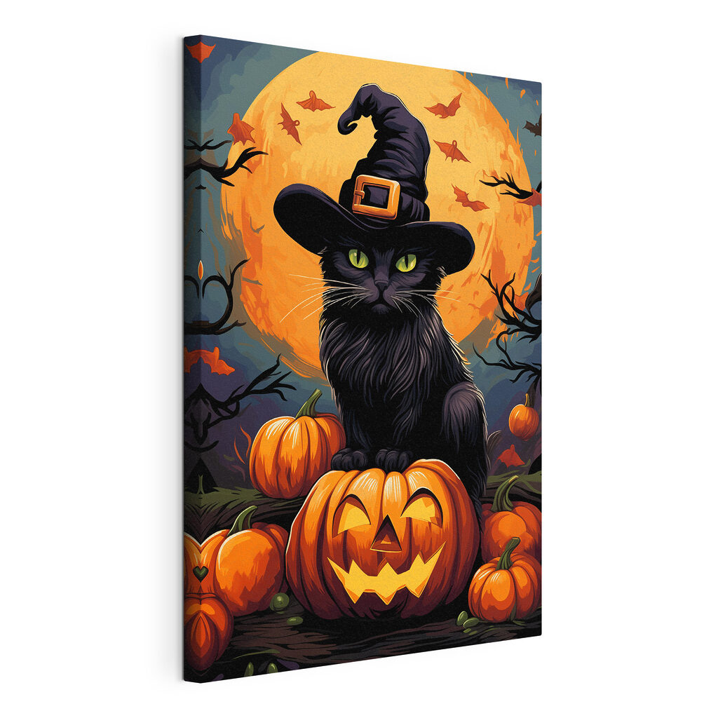 Cat wearing a hat and sitting on a pumpkin Cat wearing a hat and sitting on a pumpkin