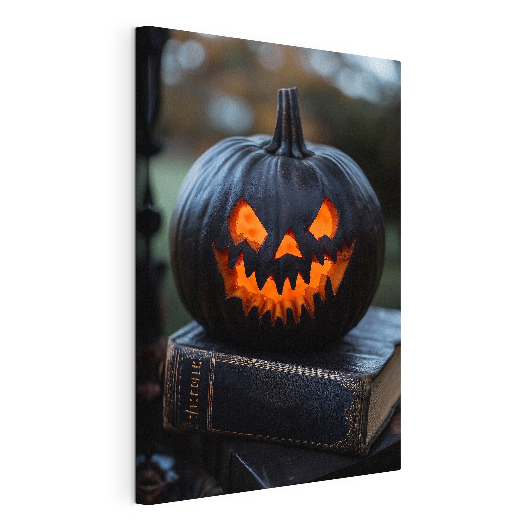 Carved pumpkin on a book