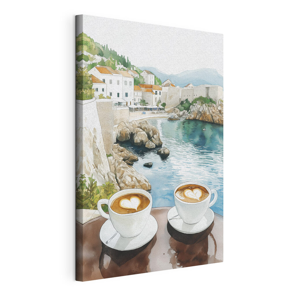 Two cups of coffee with a heart shaped foam on top of a table overlooking a body of water