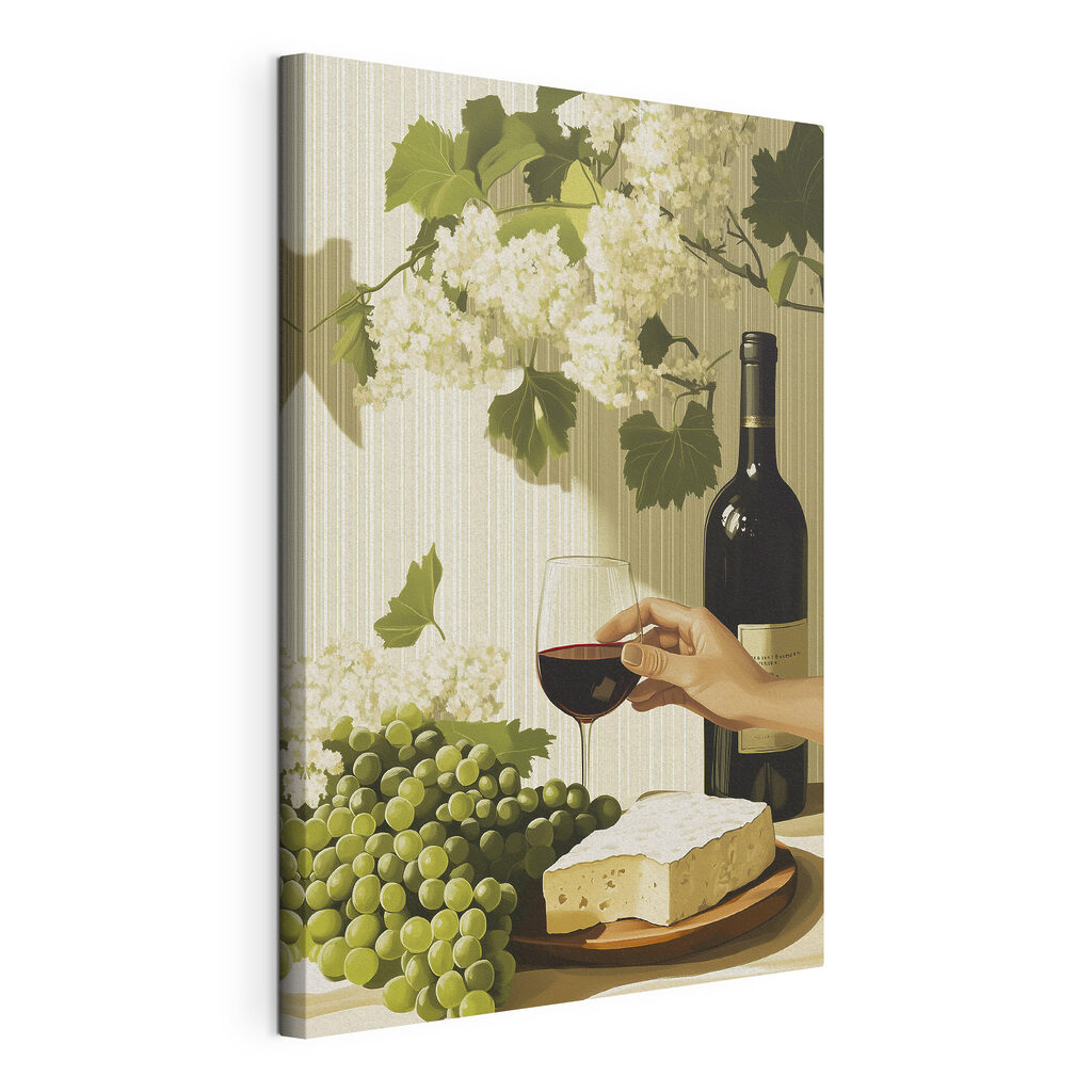 Hand holding a glass of wine next to a bottle of wine