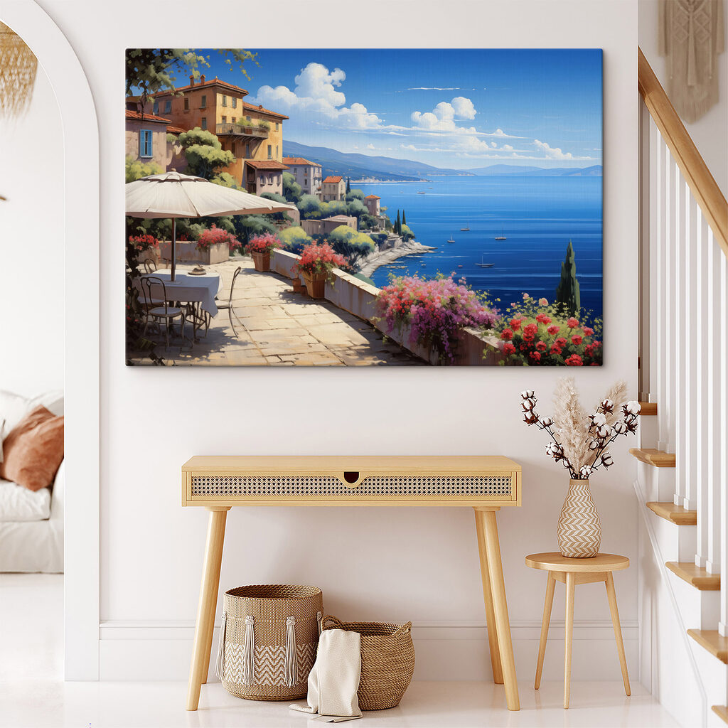 View of a town and the ocean from a balcony
