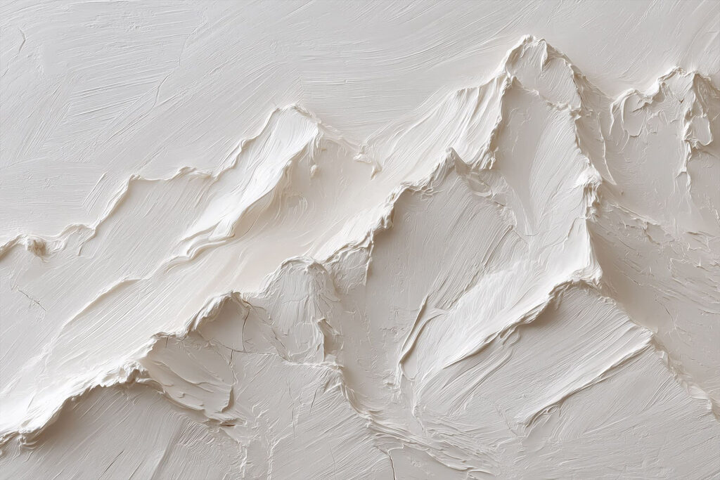 White mountain with a few layers of snow