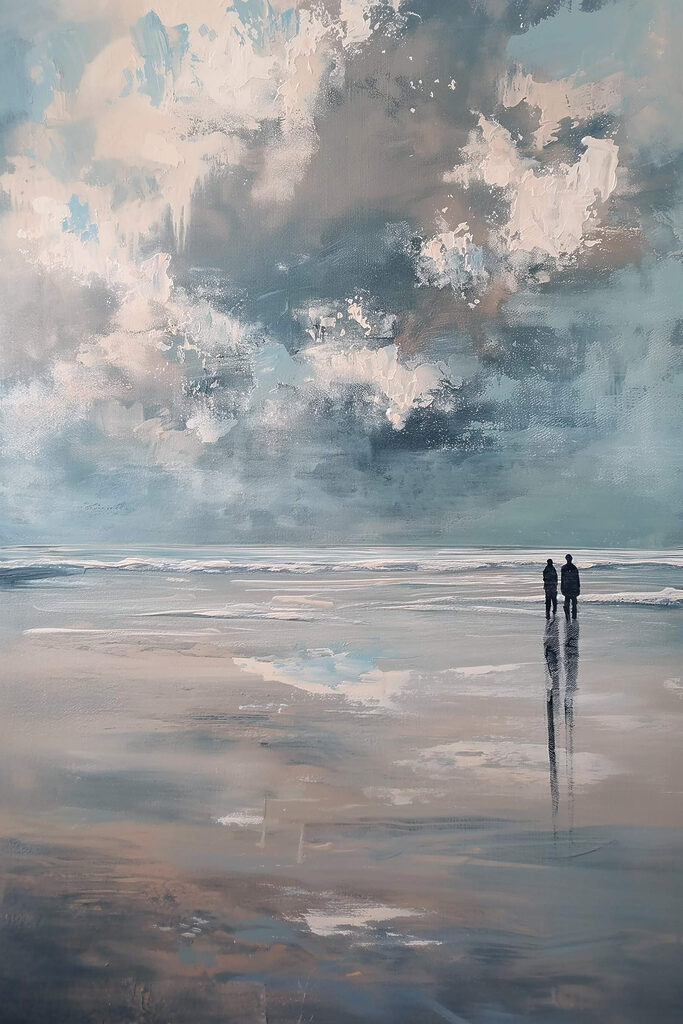 Two people standing on a beach