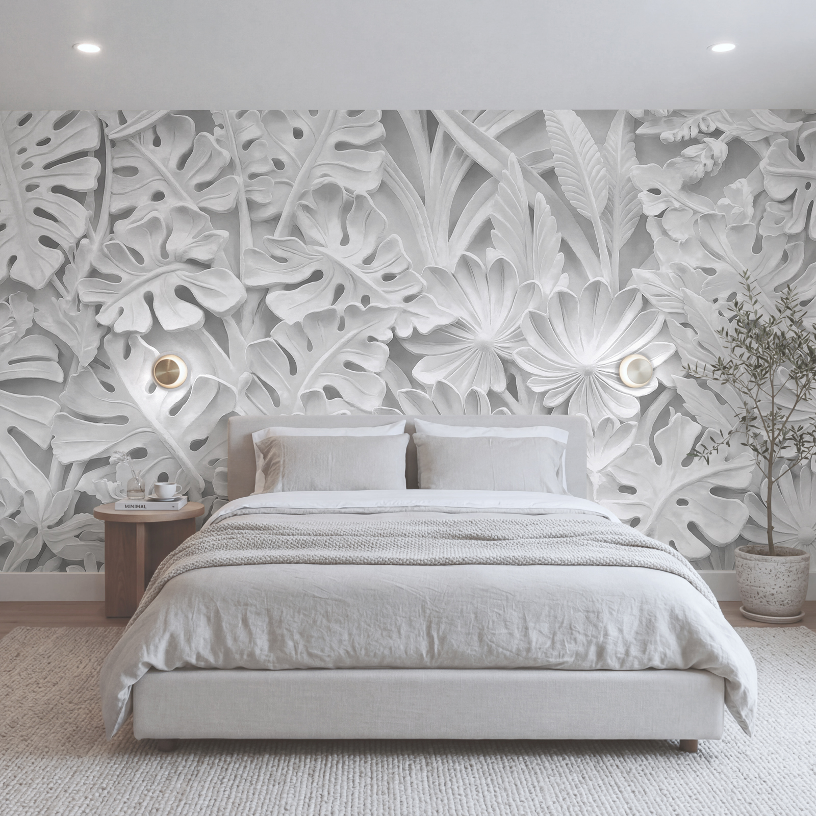 Pared blanca con flores y hojas
