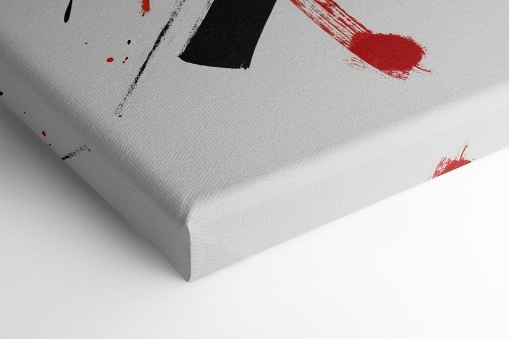 Red and black paint on a white surface